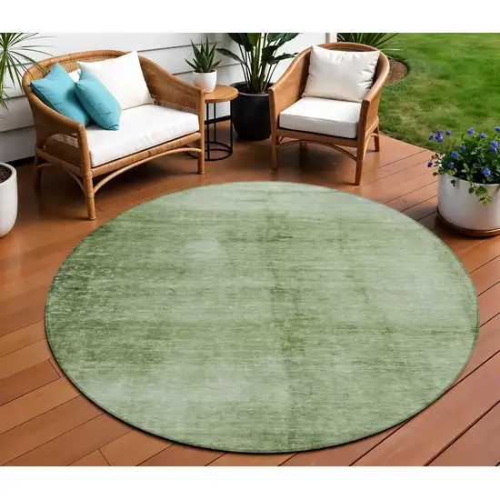 8' Artichoke Green And Ivory Round Abstract Washable Indoor Outdoor Area Rug Photo 2