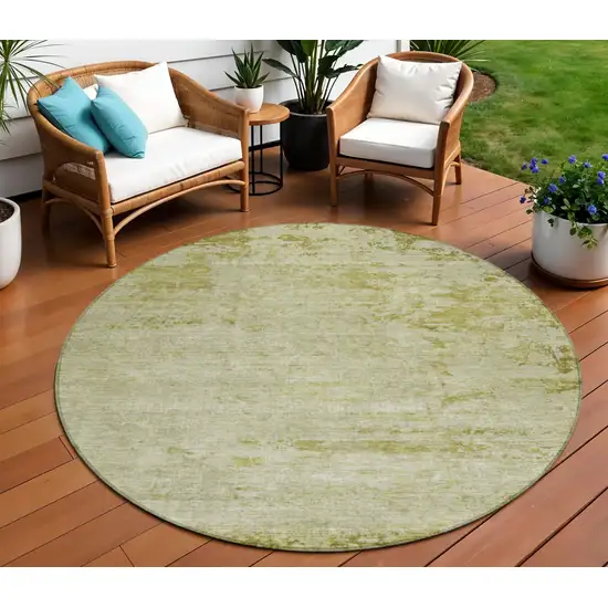 8' Artichoke Green And Ivory Round Abstract Washable Indoor Outdoor Area Rug Photo 2