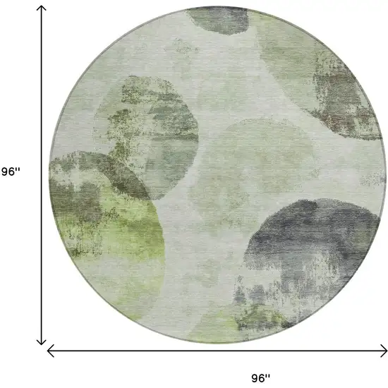 8' Artichoke Green And Ivory Round Abstract Washable Indoor Outdoor Area Rug Photo 3