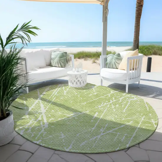 8' Artichoke Green And Ivory Round Abstract Washable Indoor Outdoor Area Rug Photo 4