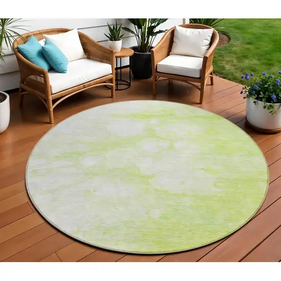 8' Artichoke Green And Ivory Round Abstract Washable Indoor Outdoor Area Rug Photo 1