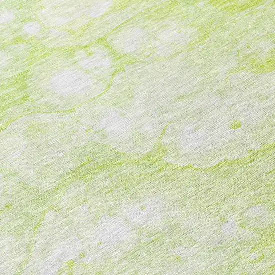 8' Artichoke Green And Ivory Round Abstract Washable Indoor Outdoor Area Rug Photo 9