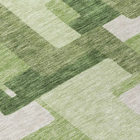 8' Artichoke Green And Ivory Round Abstract Washable Indoor Outdoor Area Rug Photo 9