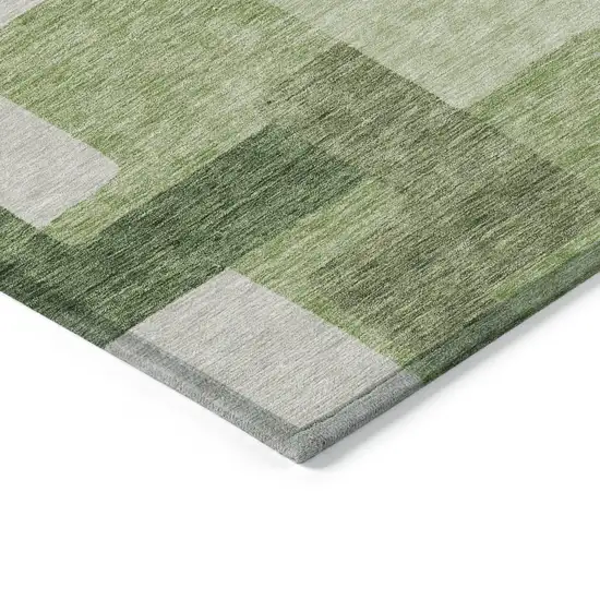 8' Artichoke Green And Ivory Round Abstract Washable Indoor Outdoor Area Rug Photo 3