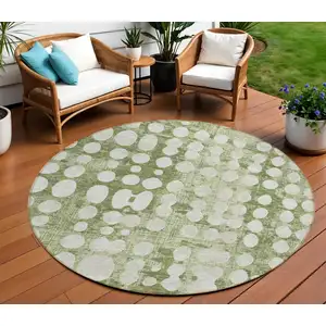 Photo of 8' Artichoke Green And Ivory Round Abstract Washable Indoor Outdoor Area Rug