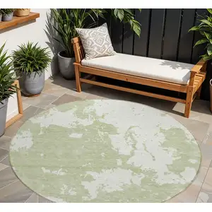 Photo of 8' Artichoke Green And Ivory Round Abstract Washable Indoor Outdoor Area Rug
