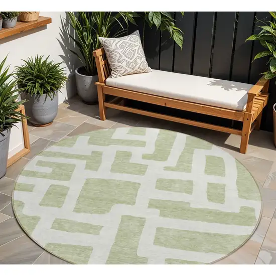 8' Artichoke Green And Ivory Round Abstract Washable Indoor Outdoor Area Rug Photo 1
