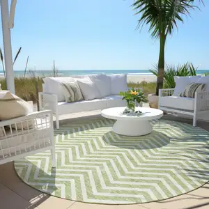 Photo of 8' Artichoke Green And Ivory Round Chevron Washable Indoor Outdoor Area Rug