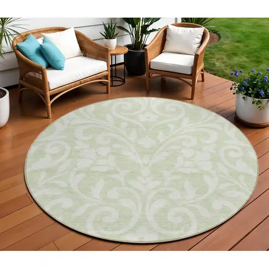 8' Artichoke Green And Ivory Round Floral Washable Indoor Outdoor Area Rug Photo 1
