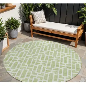 Photo of 8' Artichoke Green And Ivory Round Geometric Washable Indoor Outdoor Area Rug