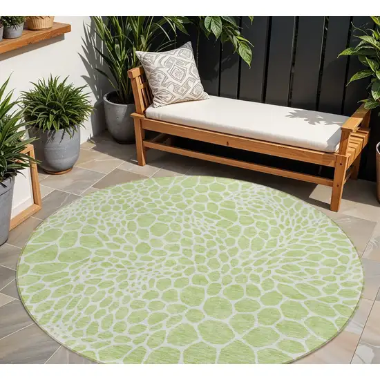 8' Artichoke Green And Ivory Round Geometric Washable Indoor Outdoor Area Rug Photo 1