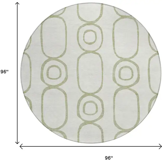 8' Artichoke Green And Ivory Round Geometric Washable Indoor Outdoor Area Rug Photo 3