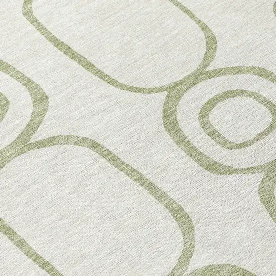 8' Artichoke Green And Ivory Round Geometric Washable Indoor Outdoor Area Rug Photo 9