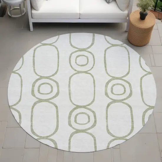 8' Artichoke Green And Ivory Round Geometric Washable Indoor Outdoor Area Rug Photo 7