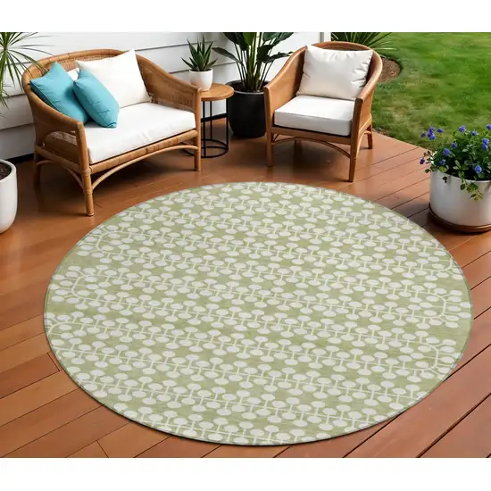 8' Artichoke Green And Ivory Round Geometric Washable Indoor Outdoor Area Rug Photo 1