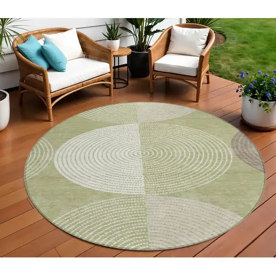 8' Artichoke Green And Ivory Round Geometric Washable Indoor Outdoor Area Rug Photo 1