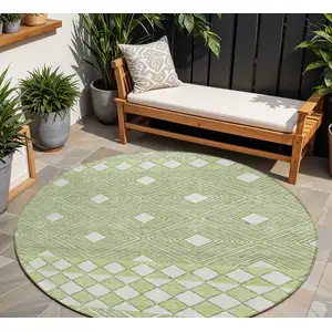 Photo of 8' Artichoke Green And Ivory Round Geometric Washable Indoor Outdoor Area Rug