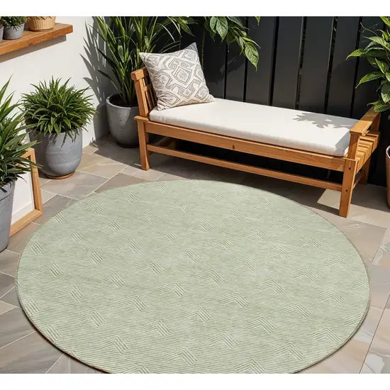 8' Artichoke Green And Ivory Round Geometric Washable Indoor Outdoor Area Rug Photo 1