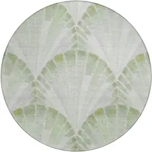 Photo of 8' Artichoke Green And Ivory Round Seashell Washable Indoor Outdoor Area Rug