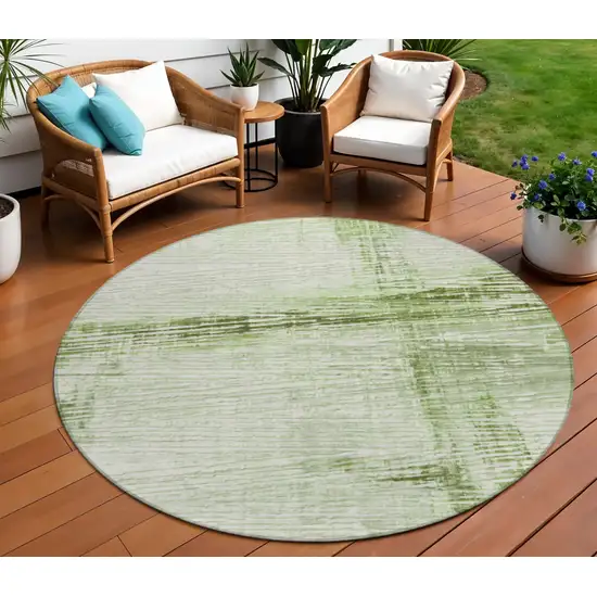 8' Artichoke Green And Ivory Round Striped Washable Indoor Outdoor Area Rug Photo 2