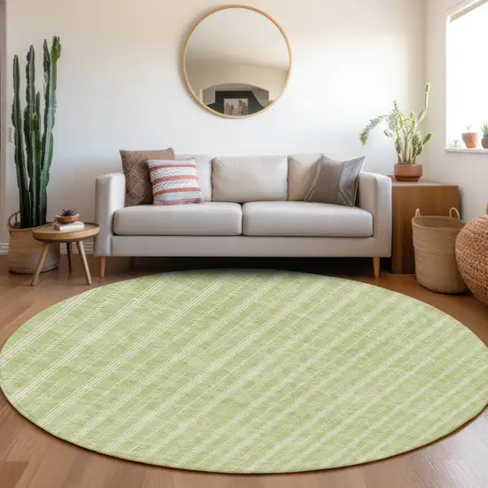 8' Artichoke Green And Ivory Round Striped Washable Indoor Outdoor Area Rug Photo 8