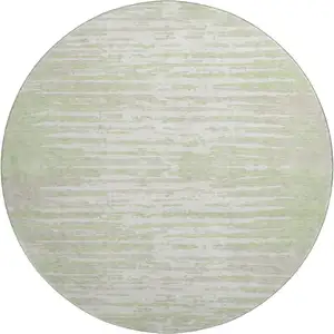 Photo of 8' Artichoke Green And Ivory Striped Washable Round Rug With UV Protection