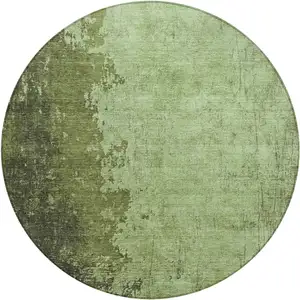 Photo of 8' Artichoke Green And Olive Green Round Abstract Washable Indoor Outdoor Area Rug