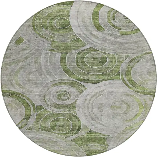 8' Artichoke Green And Silver Round Geometric Washable Indoor Outdoor Area Rug Photo 1