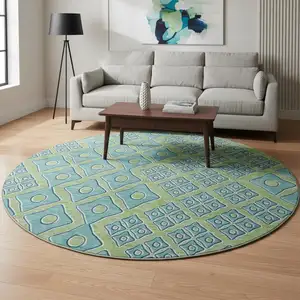 Photo of 8' Artichoke Green And Teal Geometric Washable Round Rug With UV Protection
