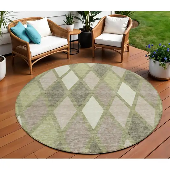 8' Artichoke Green Beige And Ivory Round Geometric Washable Indoor Outdoor Area Rug Photo 1