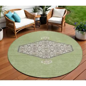 Photo of 8' Artichoke Green Beige And Ivory Round Oriental Washable Indoor Outdoor Area Rug
