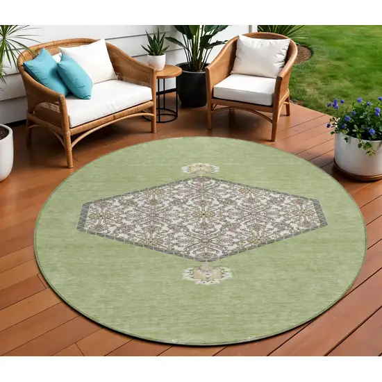 8' Artichoke Green Beige And Ivory Round Oriental Washable Indoor Outdoor Area Rug Photo 1