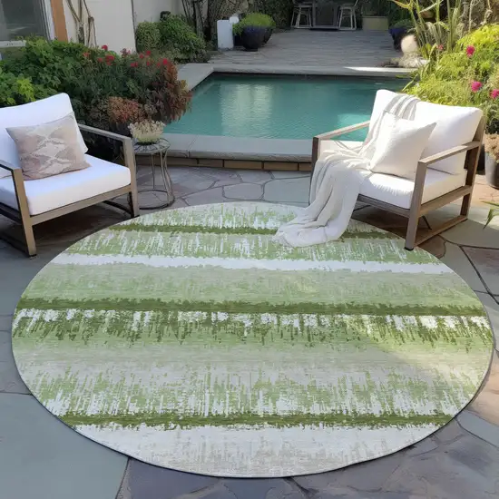 8' Artichoke Green Beige And Ivory Round Striped Washable Indoor Outdoor Area Rug Photo 6