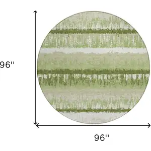 Photo of 8' Artichoke Green Beige And Ivory Round Striped Washable Indoor Outdoor Area Rug