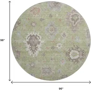 Photo of 8' Artichoke Green Beige And Taupe Floral Medallion Washable Round Rug With UV Protection