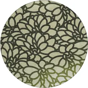 Photo of 8' Artichoke Green Black And Ivory Round Botanical Leaves Washable Indoor Outdoor Area Rug