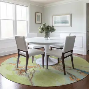 Photo of 8' Artichoke Green Blue And Brown Round Abstract Washable Indoor Outdoor Area Rug