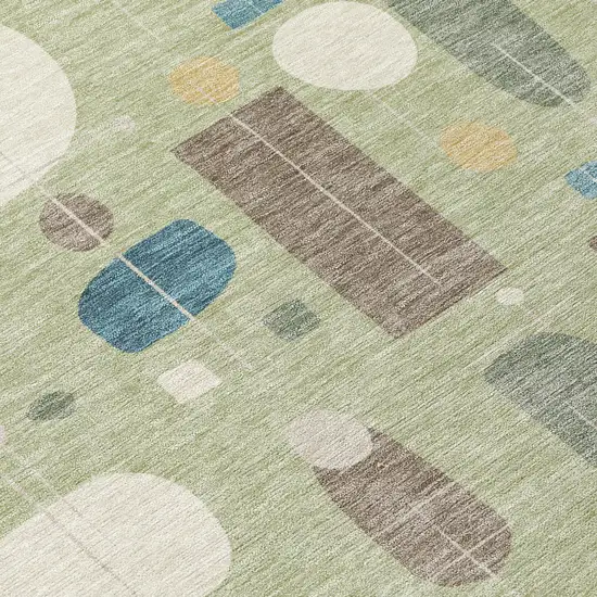 8' Artichoke Green Blue And Ivory Round Geometric Washable Indoor Outdoor Area Rug Photo 9