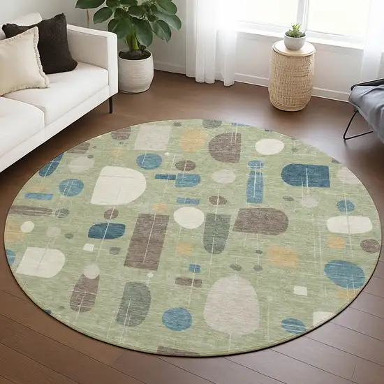 8' Artichoke Green Blue And Ivory Round Geometric Washable Indoor Outdoor Area Rug Photo 5