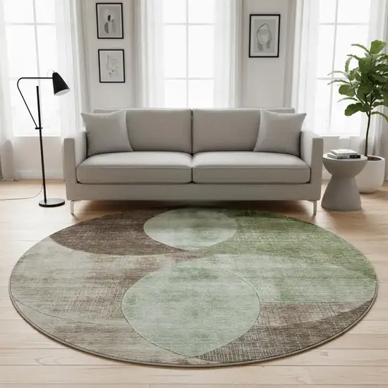 8' Artichoke Green Brown And Beige Geometric Washable Round Rug With UV Protection Photo 2
