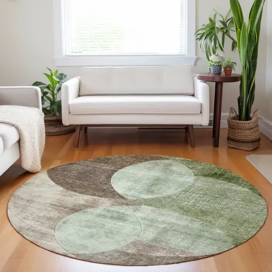 8' Artichoke Green Brown And Beige Round Geometric Washable Indoor Outdoor Area Rug Photo 8