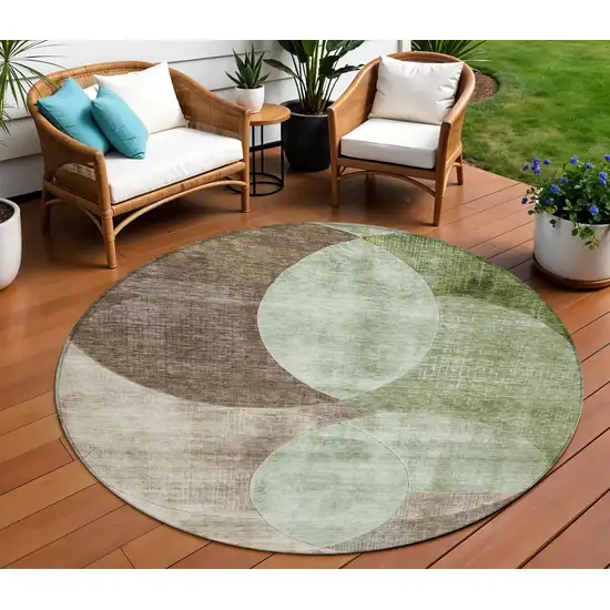 8' Artichoke Green Brown And Beige Round Geometric Washable Indoor Outdoor Area Rug Photo 1