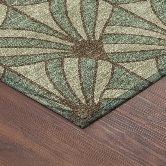 8' Artichoke Green Brown And Beige Round Seashell Washable Indoor Outdoor Area Rug Photo 8