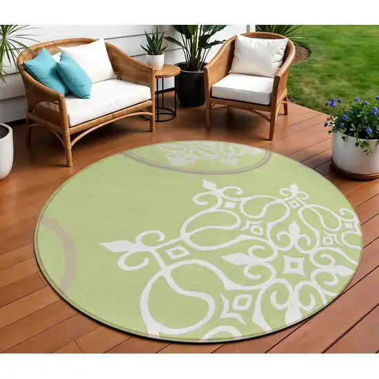 8' Artichoke Green Brown And Ivory Round Floral Medallion Washable Indoor Outdoor Area Rug Photo 1