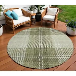 Photo of 8' Artichoke Green Brown And Ivory Round Plaid Washable Indoor Outdoor Area Rug