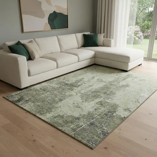 8' Artichoke Green Charcoal And Ivory Abstract Washable Area Rug With UV Protection Photo 2