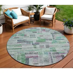 Photo of 8' Artichoke Green Charcoal And Purple Round Striped Washable Indoor Outdoor Area Rug