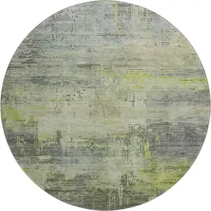 Photo of 8' Artichoke Green Charcoal And Silver Abstract Washable Round Rug With UV Protection