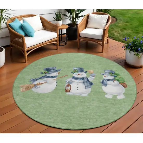 8' Artichoke Green Denim Blue And Ivory Round Snowmen Washable Indoor Outdoor Area Rug Photo 1