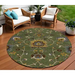Photo of 8' Artichoke Green Gold And Blue Round Floral Washable Indoor Outdoor Area Rug